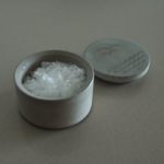 small jar filled with flake salt