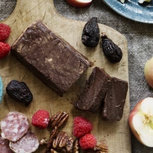 bleu hour terrine chocolat sliced with walnuts, berries, figs, and apples