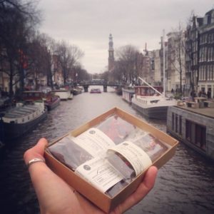 tavernier chocolates held out over a european river