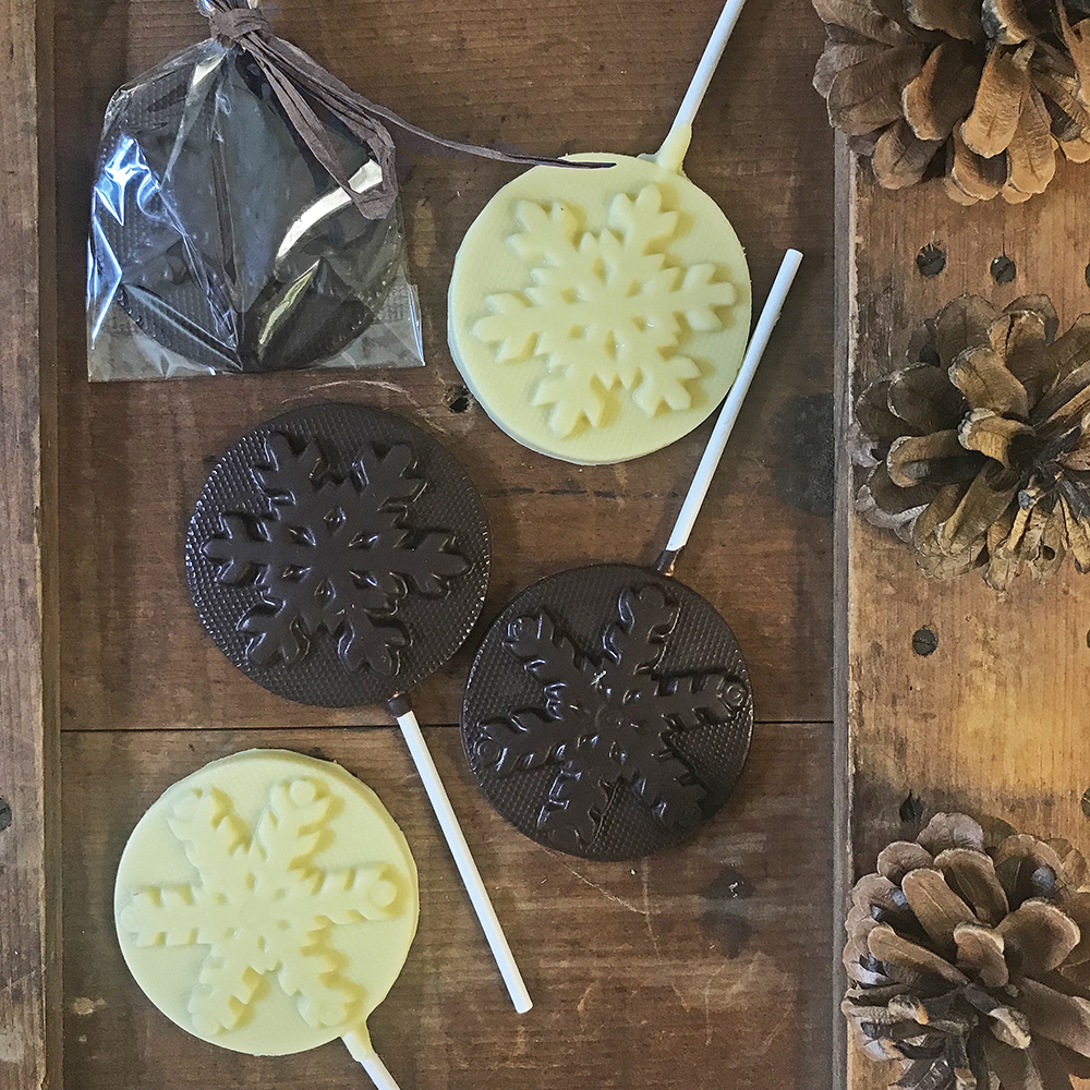 snowflake pops in white and dark chocolate