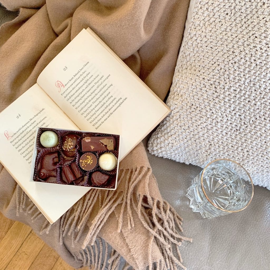 box of chocolates and a good book