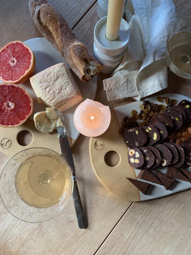 cheese board with chocolate charcuterie and muts