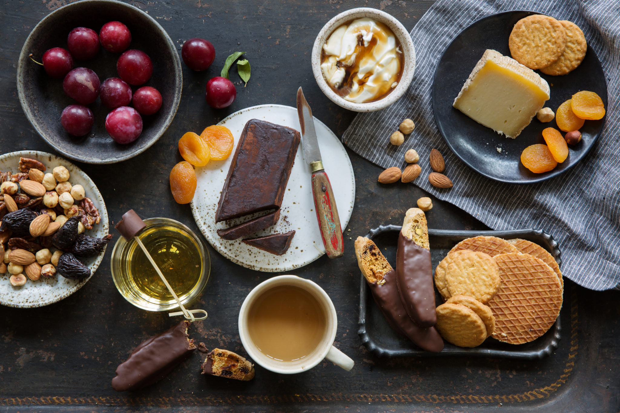 cheese and chocolate charcuterie with dried and fresh fruits