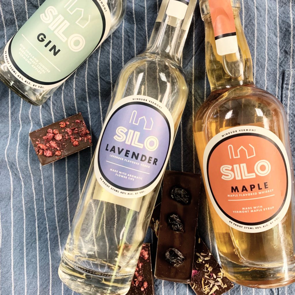 Bottles of SILO's gin, maple whiskey, and lavender vodka