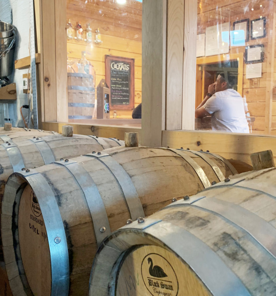 Whiskey barrels and tasting room at SILO Distillery