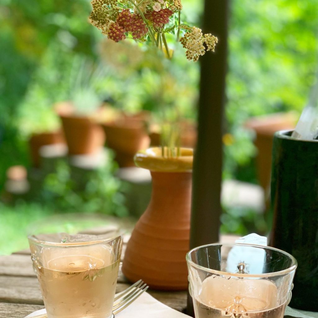 Two cocktails at a summer dinner