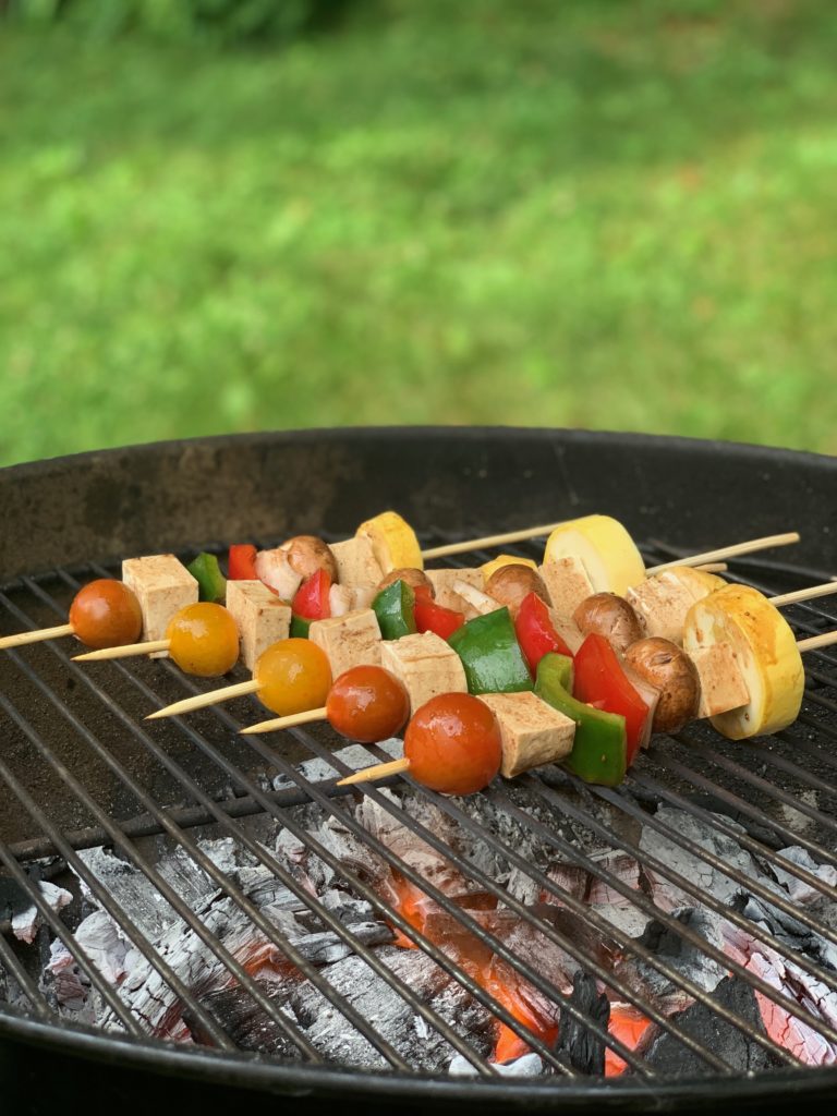 Summer kababs grilling over charcoal