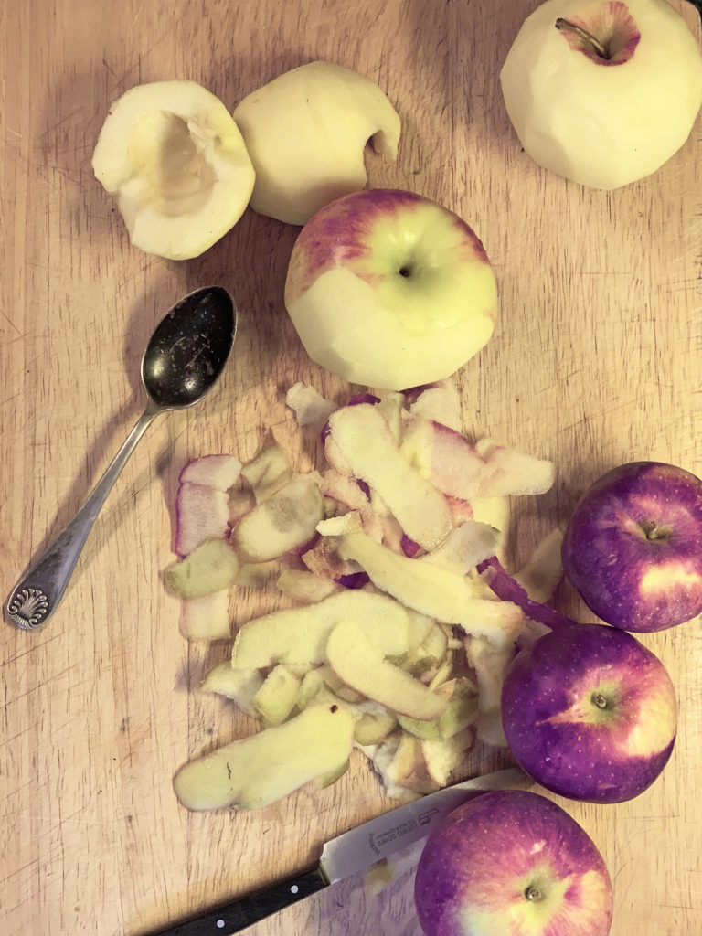 Peeling apples for french apple cake