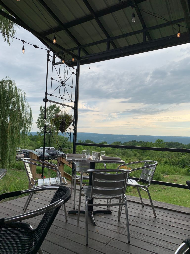 View of the valley and a restaurant's outdoor patio