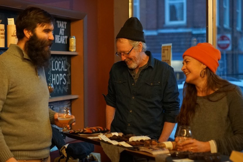 John and Dar Singer talking to Chris, a brewer at Hermit Thrush