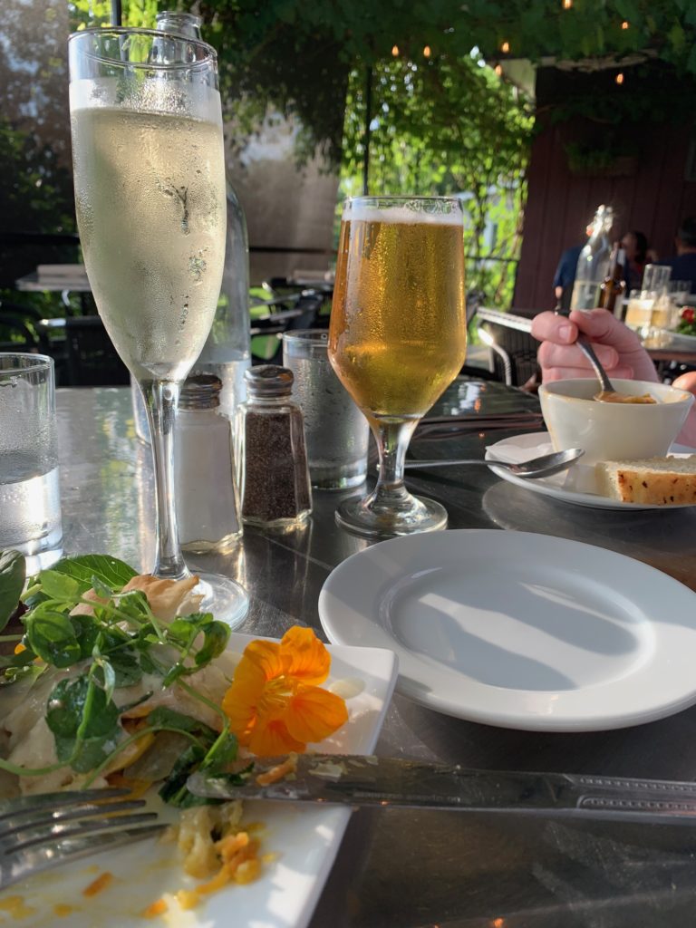 Glass of wine and beer at a restaurant in new york wine country