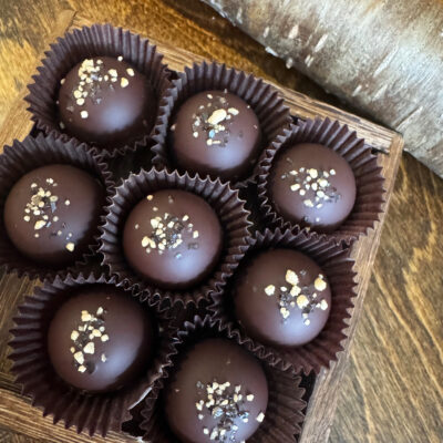 box of 9 round espresso birch truffles topped with black lava salt